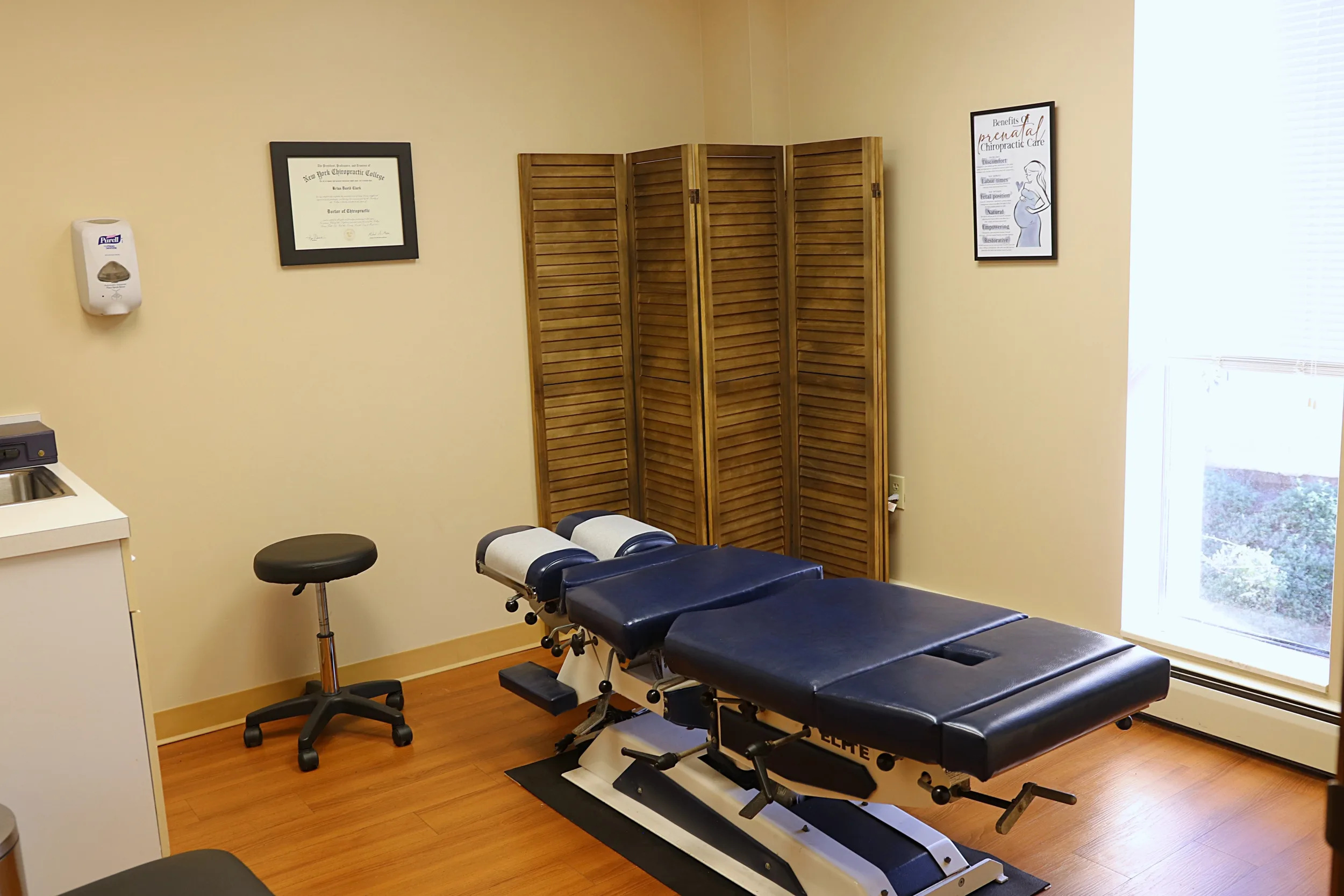 A chiropractic treatment table at Movement Improvement